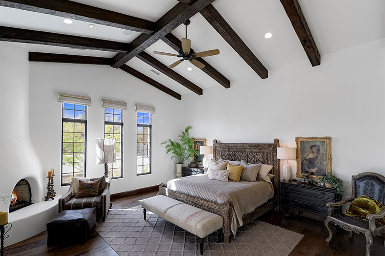 An image of Volterra’s faux wood beams installed in a bedroom.