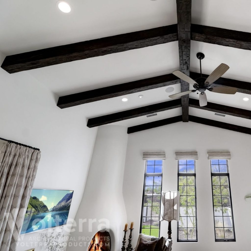 Dark faux wood ceiling beams in a bedroom