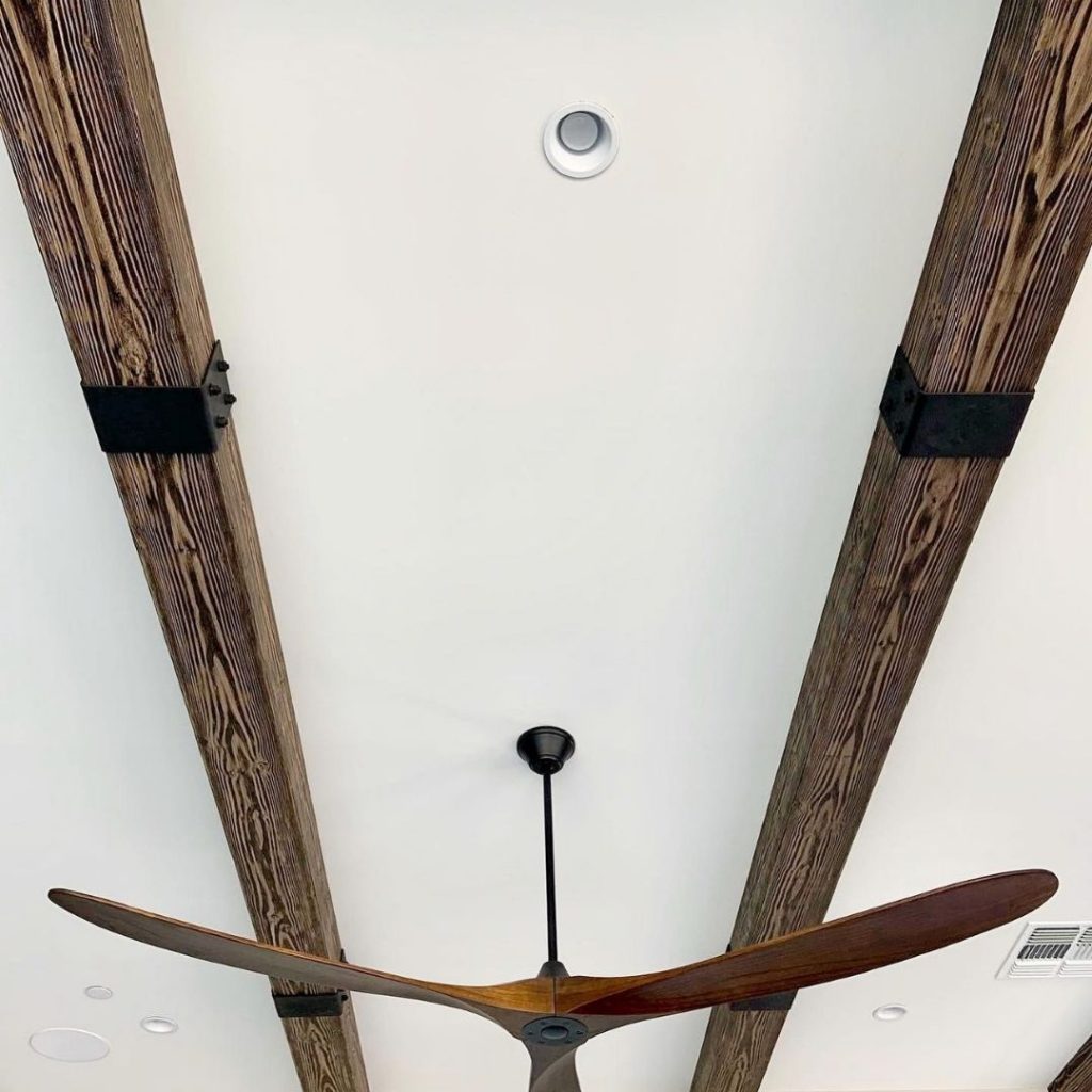 Faux wood ceiling beams with faux beam straps