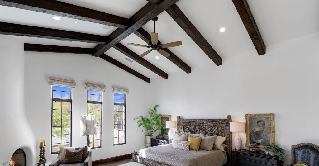Faux wood beams in bedroom