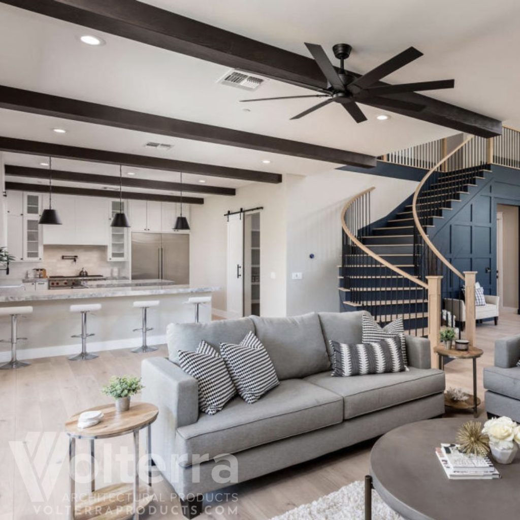 living room and kitchen with wood beams